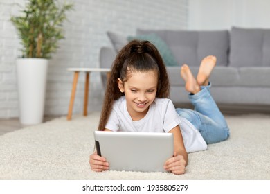 Little Child Girl Using Digital Tablet