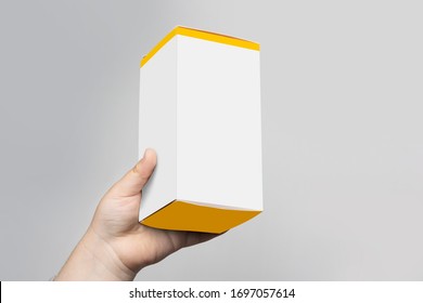 Little Child Hand Holding A Small Cubical Box, Psd Layers Mock Up Template Ready For Your Design