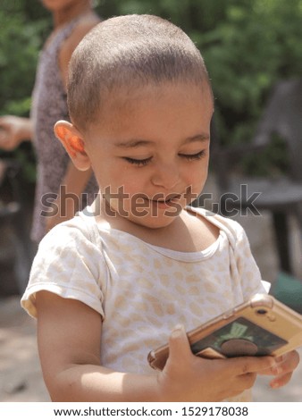 Similar – grandma reading a book to a child