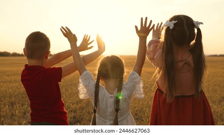 little child kid boy girl stretch their hand sun, ray fingers, vacation travel, childhood and divinity, kids love nature, outdoor family gathering, religious joy outdoors, sunset prayer family, nature - Powered by Shutterstock