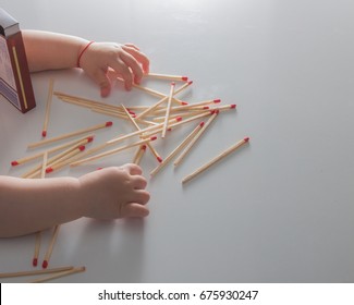 A Little Child Plays With Matches