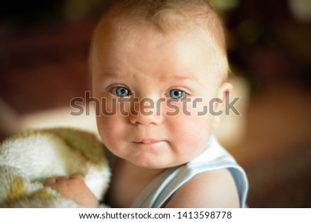 Similar – Cute baby in hands of crop anonymous father