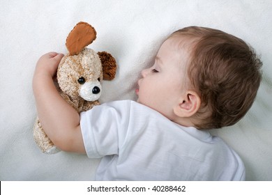 Little Child Sleeping In Happiness And Family Love