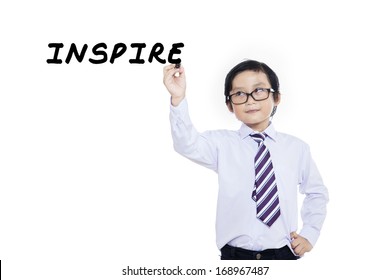 Little Child Writing Something On Glass Board