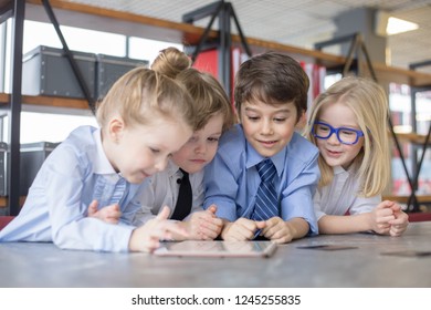 Little Children Businessmen Sharing Ideas In Office.