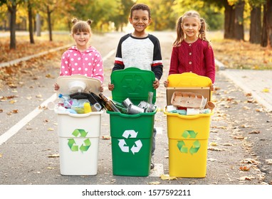 Little children collecting trash outdoors. Concept of recycling - Powered by Shutterstock