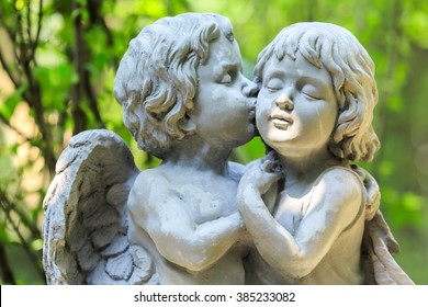 Little Couple Angel Sculpture In Green Garden