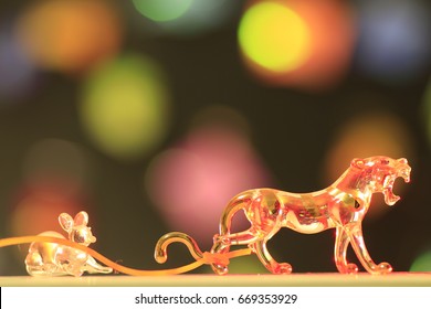 the little crystal mouse and crystal lion and many color bokeh