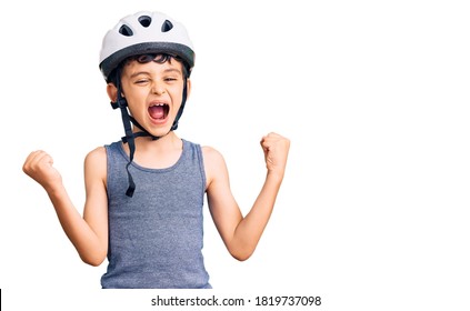 Little Cute Boy Kid Wearing Bike Helmet Screaming Proud, Celebrating Victory And Success Very Excited With Raised Arms 