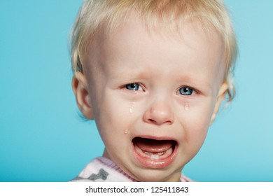 little cute child with tears on face