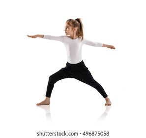 Little Cute Girl Doing Yoga Exercises