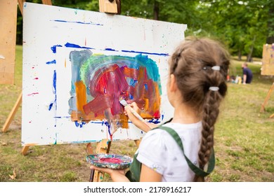 Little Cute Girl Draws A Picture With Acrylic Paints, Art Therapy, Children's Creativity.