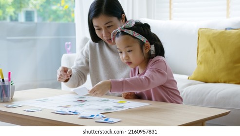 Little Cute Girl Play And Learn Offline Class Computer Language Game Unplugged Coding Computing Concept With Mom For Asia Kindergarten Gen Z Smart Kids Sit At Table Home Sofa. STEM STEAM ICT Skill.