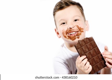 Little Cute Kid Eating Chocolate