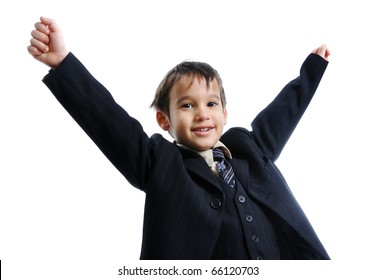 Little cute kid, wearing a business suit with a tie, celebrating a win, success