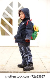 Little Cute Preschool Child With Bag On His Back