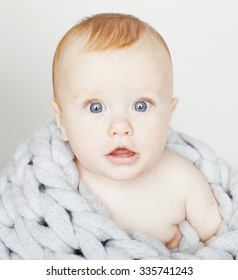 Little Cute Red Head Baby In Scarf All Over Him Close Up Isolated, Adorable Kid Winter Cold