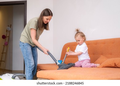 Little Daughter Cleaning In The House, Child Dusting, Cute Little Helper Girl Washing Floor With Mop, Happy Family Cleans The Room.