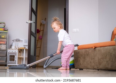 Little Daughter Cleaning In The House, Child Dusting, Cute Little Helper Girl Washing Floor With Mop, Happy Family Cleans The Room.