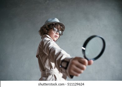 Little Detective With A Magnifying Glass