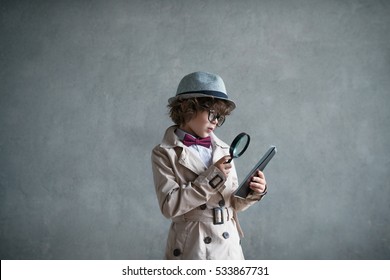 Little Detective With A Magnifying Glass