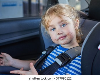 Little Dirty Girl , Baby In A Safety Car Seat. Safety And Security