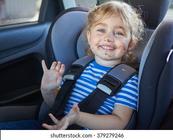 Little Dirty Girl , Baby In A Safety Car Seat. Safety And Security