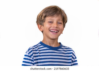 Little Elementary Age Boy Smiling.Child On A White Background.  Happy	