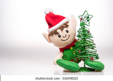 Little Elf Handmade Toy Christmas Decoration With Christmas Tree On White Background