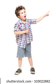 A Little Excited Boy Pointing At Something Isolated On White