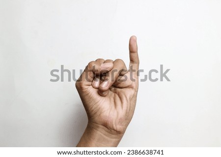 The little finger of a man's hand on a white background. pilpres or pemilu concept