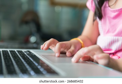 Little finger touch on touch pad notebook - Powered by Shutterstock