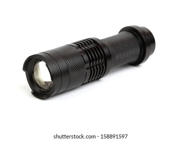 Little flashlight isolated on white