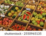 Little fruits made out of wood on the annual fair Auerdult in Munich Germany