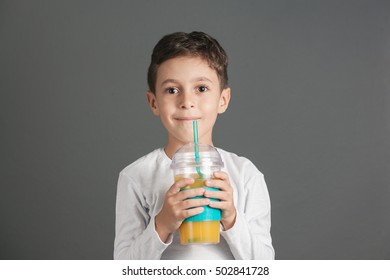 Little Funny Boy Drinking Fresh Juice Stock Photo (Edit Now) 502841686