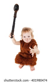Little funny caveman boy in a suit with a dirty face holding an ax. Humorous concept ancient caveman. Isolated on white.