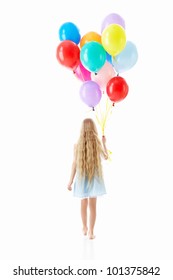 Little girl with balloons on a white background