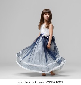 Little Girl In Beautiful Dress Portrait 