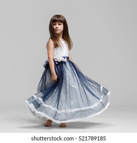 Little girl in beautiful dress portrait 