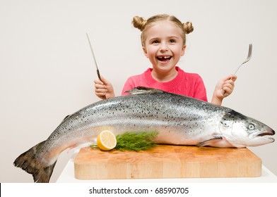 Little Girl And Big Fresh Fish - Healthy Eating Seafood