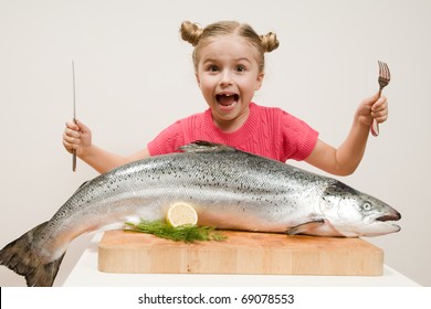 Little Girl And Big Fresh Fish - Healthy Eating Seafood