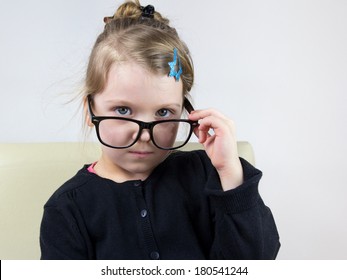 Little Girl With Big Glasses