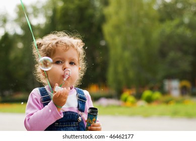 Little Girl Blow Bubbles Street Stock Photo (Edit Now) 46462177