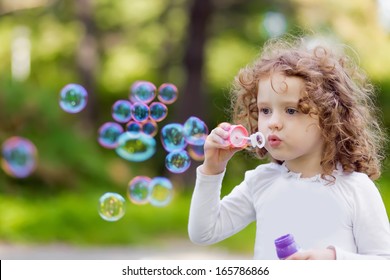 Little Girl Blowing Soap Bubbles Closeup Stock Photo 272236007 ...