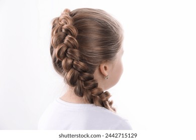 Little girl with braided hair on white background, back view - Powered by Shutterstock