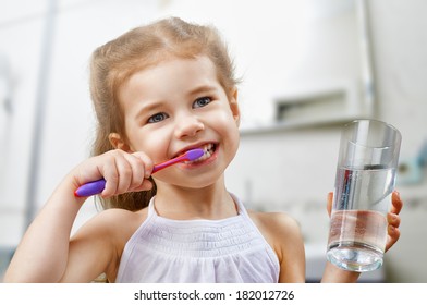 Little Girl Brushing Teeth