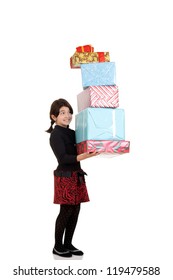 Little Girl Carrying Huge Pile Of Christmas Presents