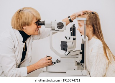 Little girl checking up her sight at ophthalmology center