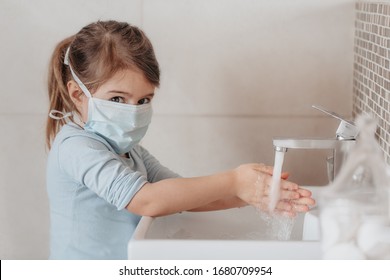 Little Girl, Child Washing Her Hands In The Basin, Bathroom Sink, Wearing Medical Face Mask, Coronavirus Hands Disinfection