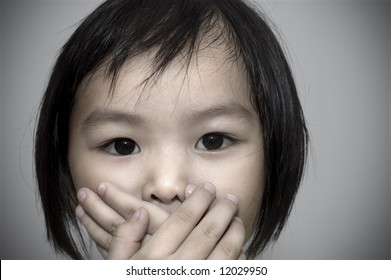 Little Girl Covering Her Mouth, Crime Witness Concept.